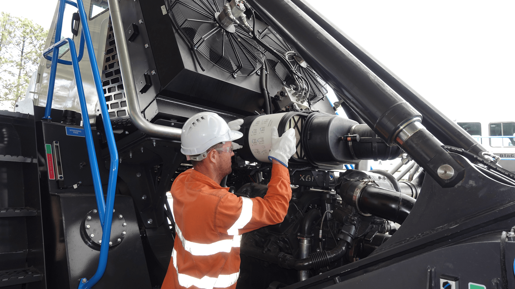 Technician servicing the X60 truck